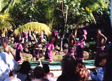 Dancers on long canoes