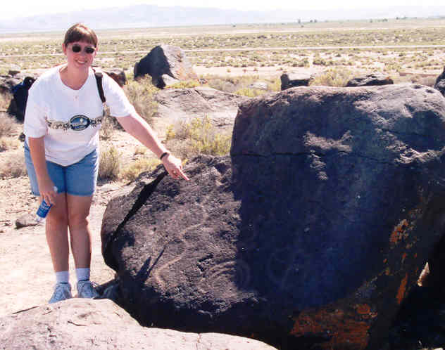 Julie pointing out some of the markings found along the trail
