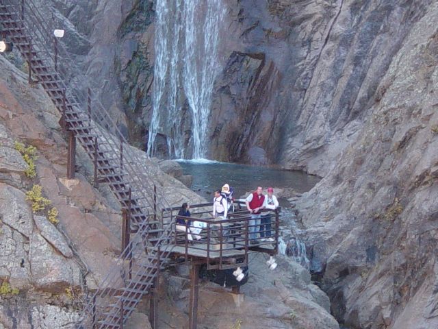 James and Eric at a stair landing near a pool part way up Seven Falls