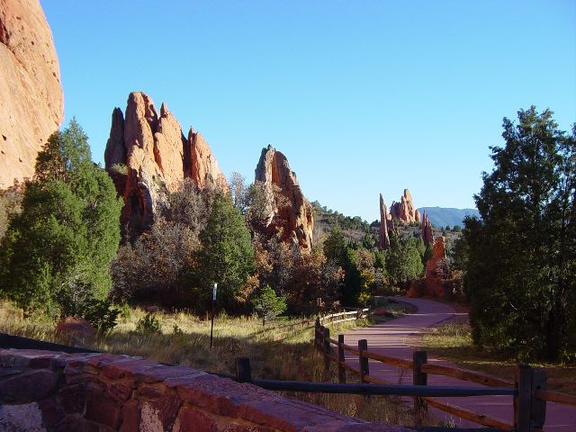 Red rock formations sticking up out of the ground