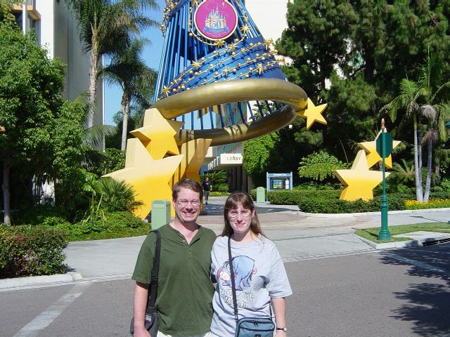 Julie and James in front of artistic Sorcerer's hat
