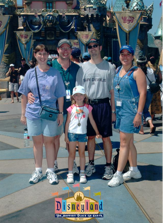 5 people in front of the castle