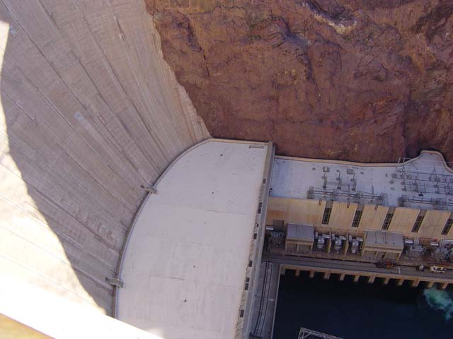 View from the top down the dry side of Hoover Dam to the generator plants