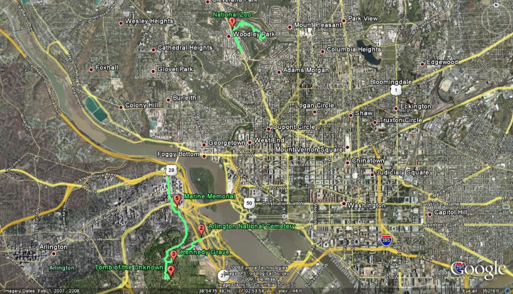 An arial view of the National Mall in Washington, DC with a green line and red markers indicating different sites