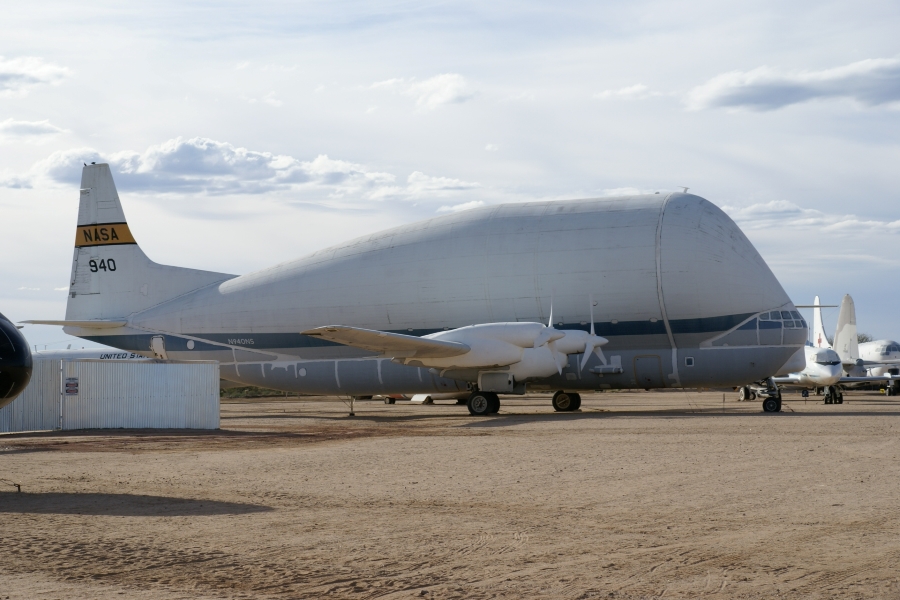 A large plane with a large bulbous fuselage extending high above the wings