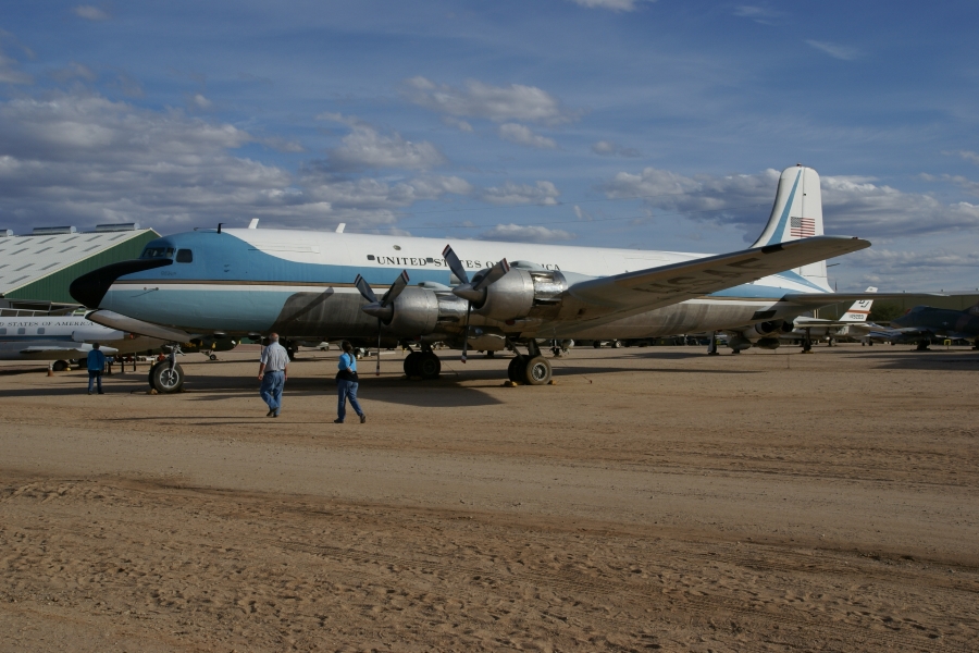 An older style passenger with the blue strip commonly seen on planes used by the President of the United States
