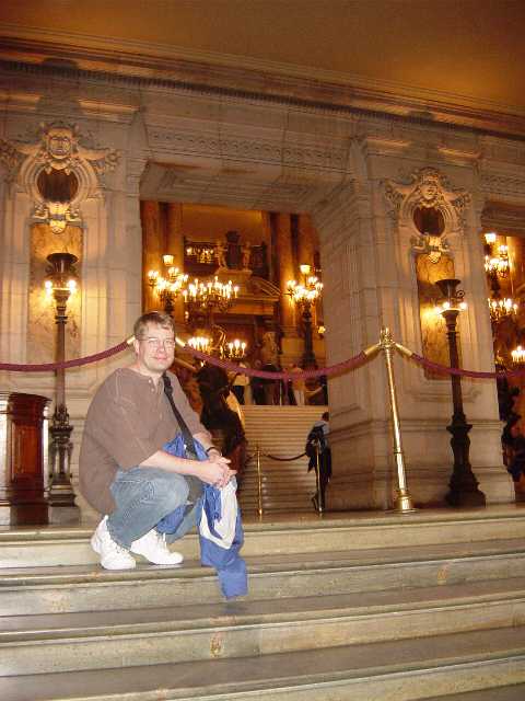 James on the stairs in the lobby of the opera