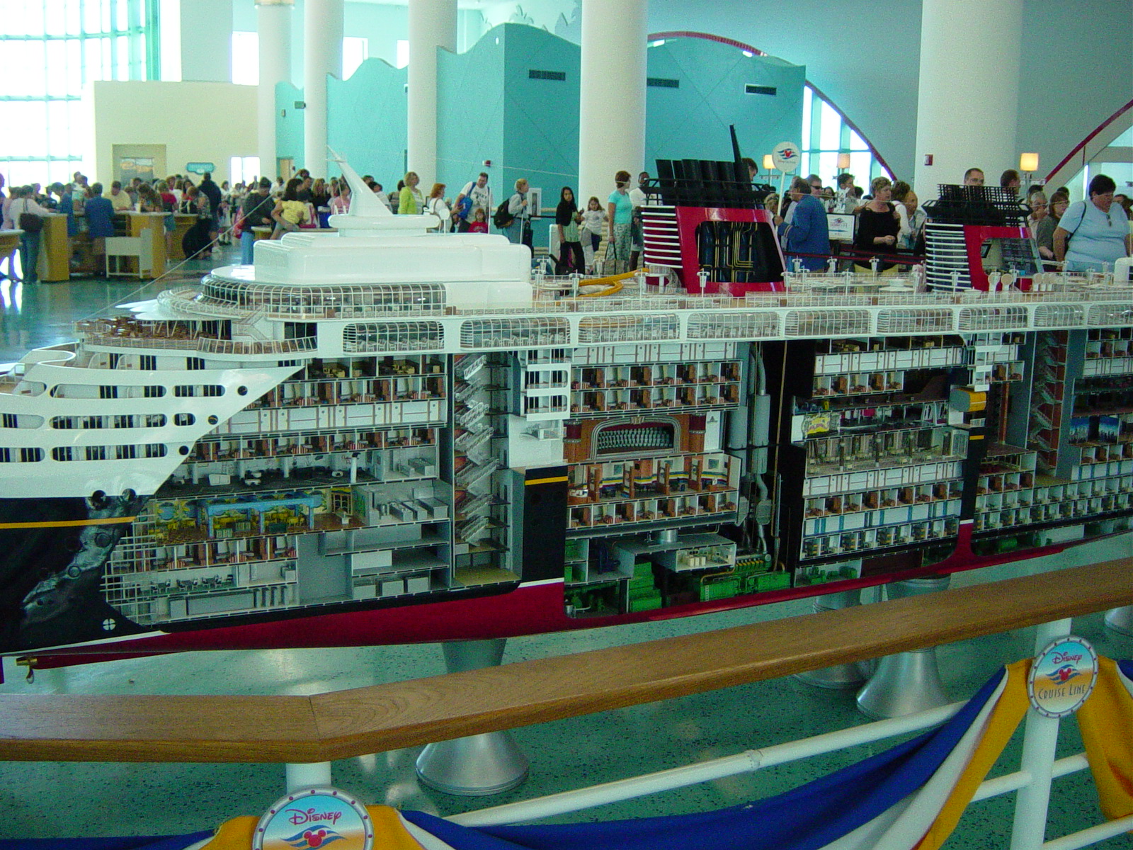 Model with cut away side of cruise ship