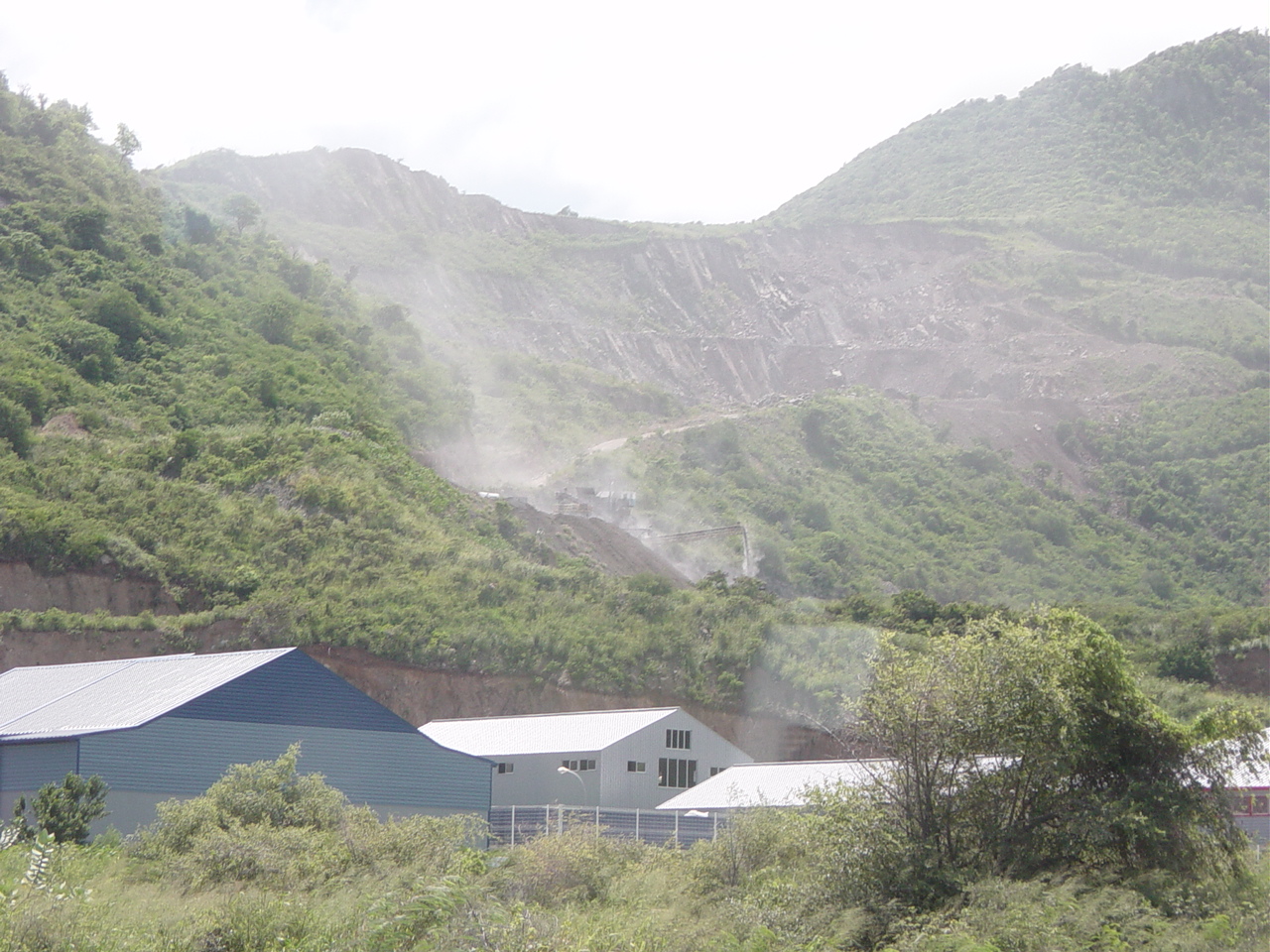 Exposed rock on hillside from mining operations