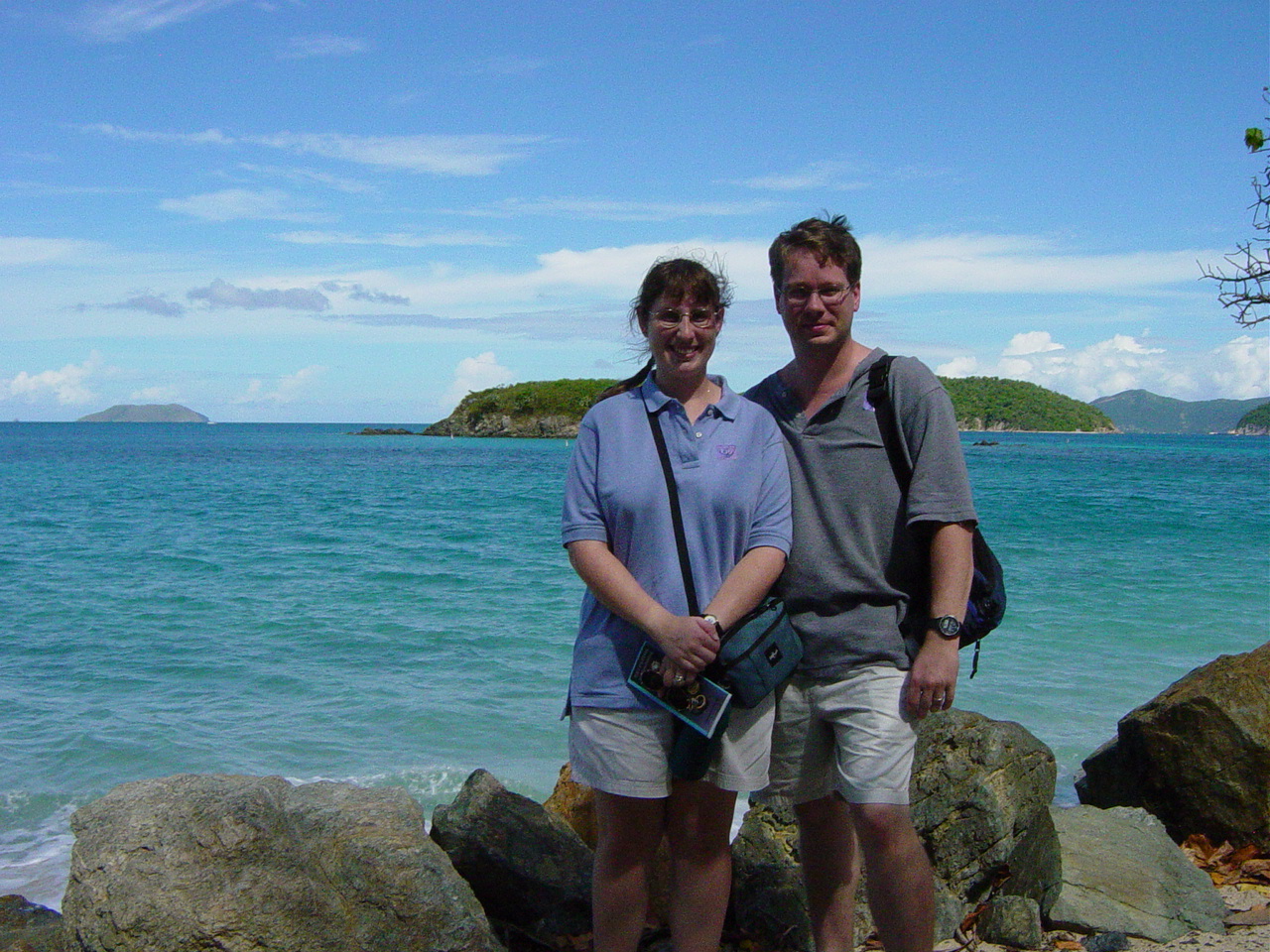James and Julie with open water and a small green islet behind them