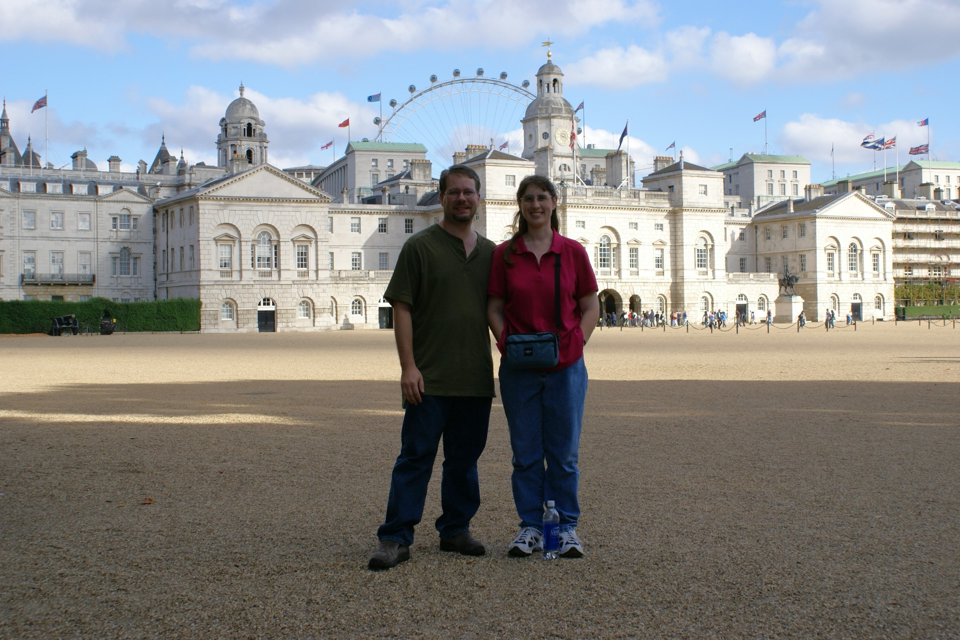 James and Julie in the large courtyard of an imposing white building