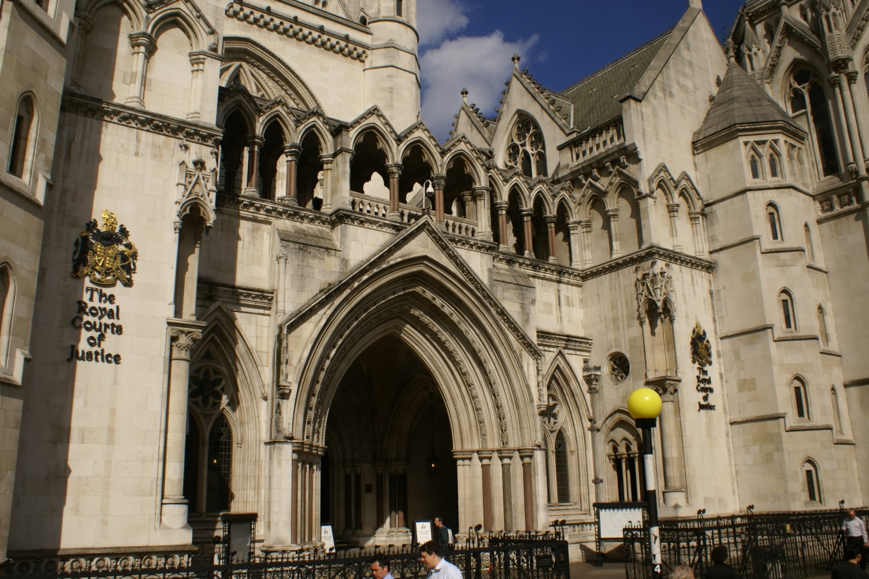 Ornate white building with gothic style arches