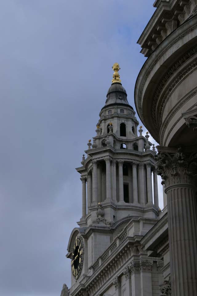 Close up view of white stone clock tower on St. Paul’s Cathedral