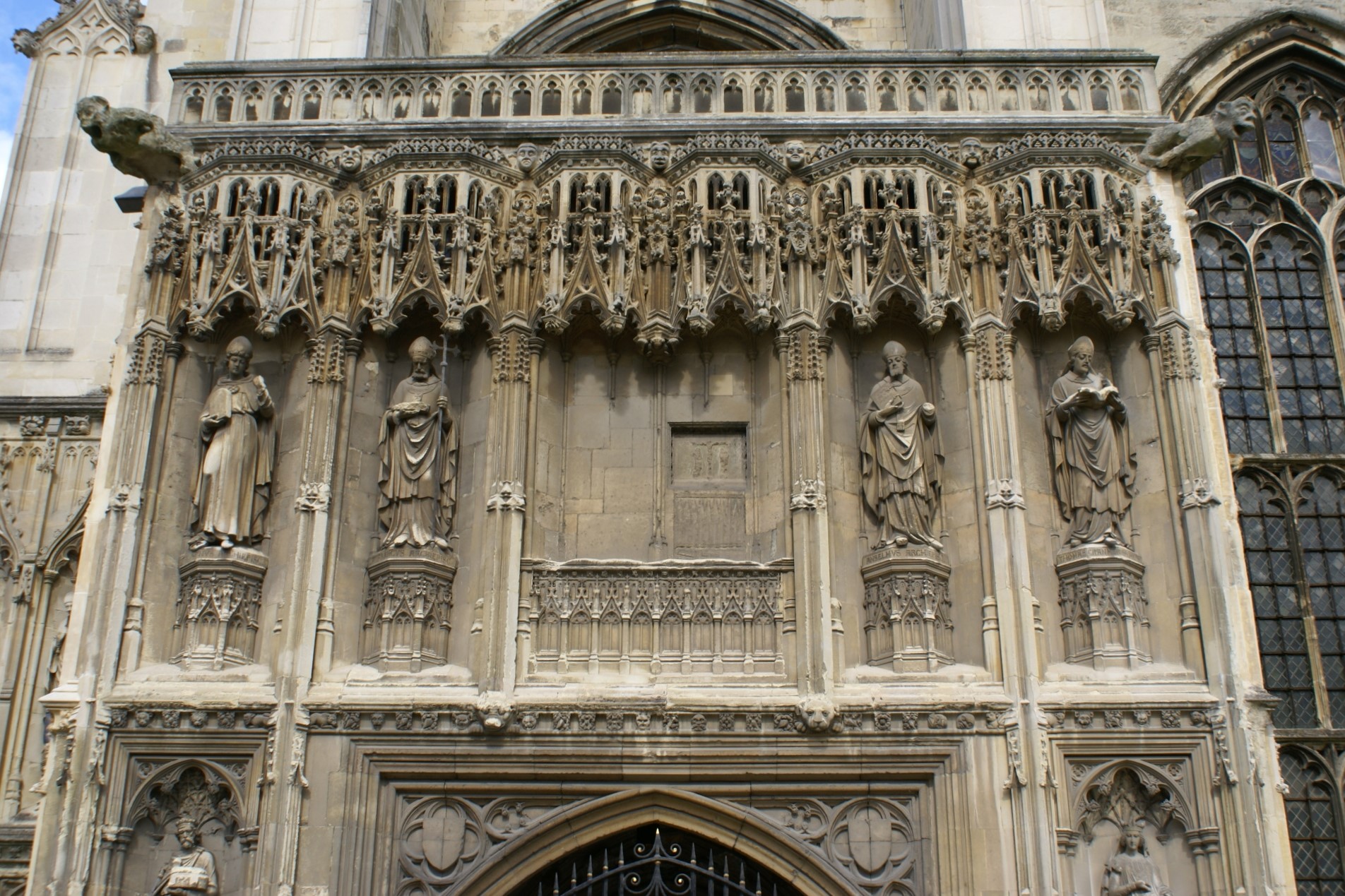 Stone carvings and statues surround the cathedral’s entrance door
