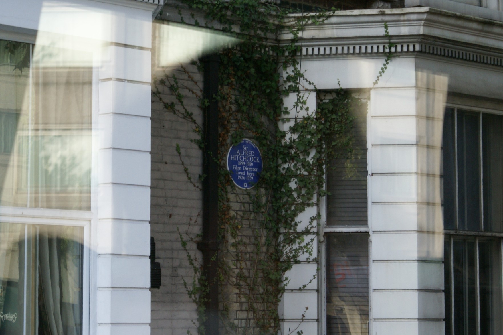 Blue plague identifying house where Alfred Hitchcock lived