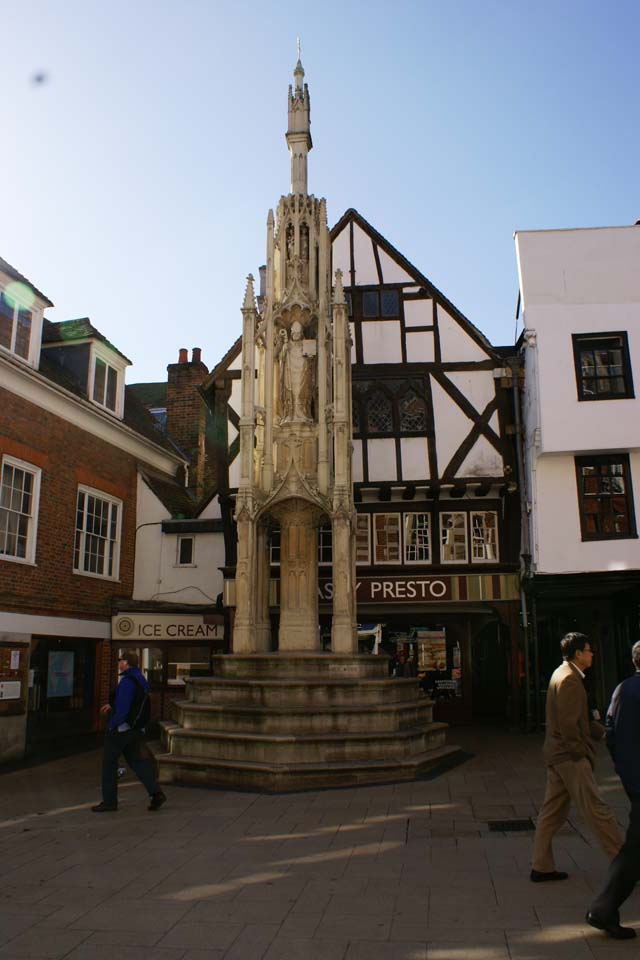 Ornate stone memorial on a six-tier base