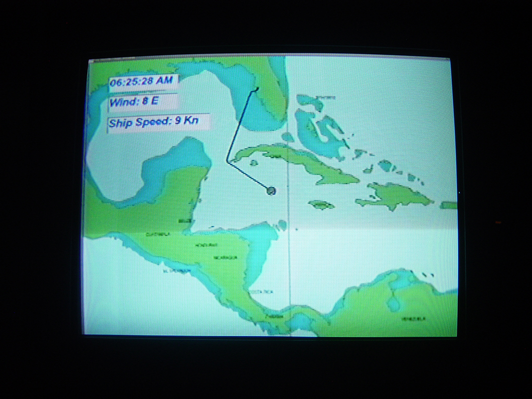 Display showing ship route from Tampa to Grand Cayman