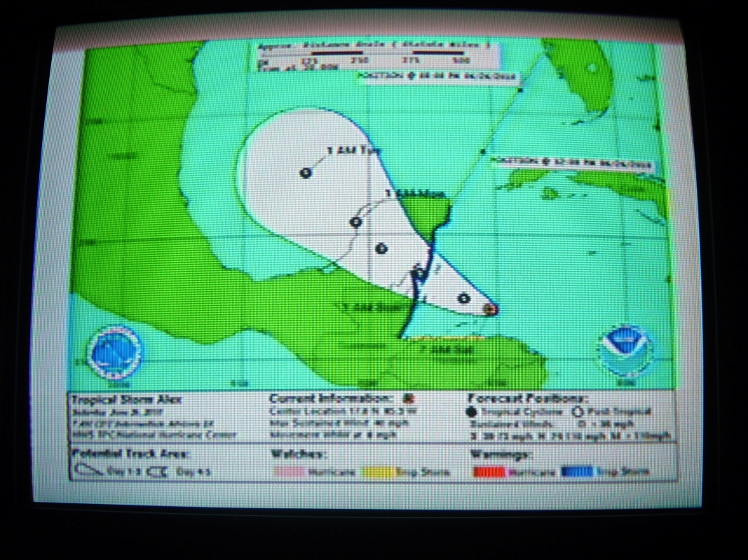 Display showing Yucatan peninsula with tropical storm path