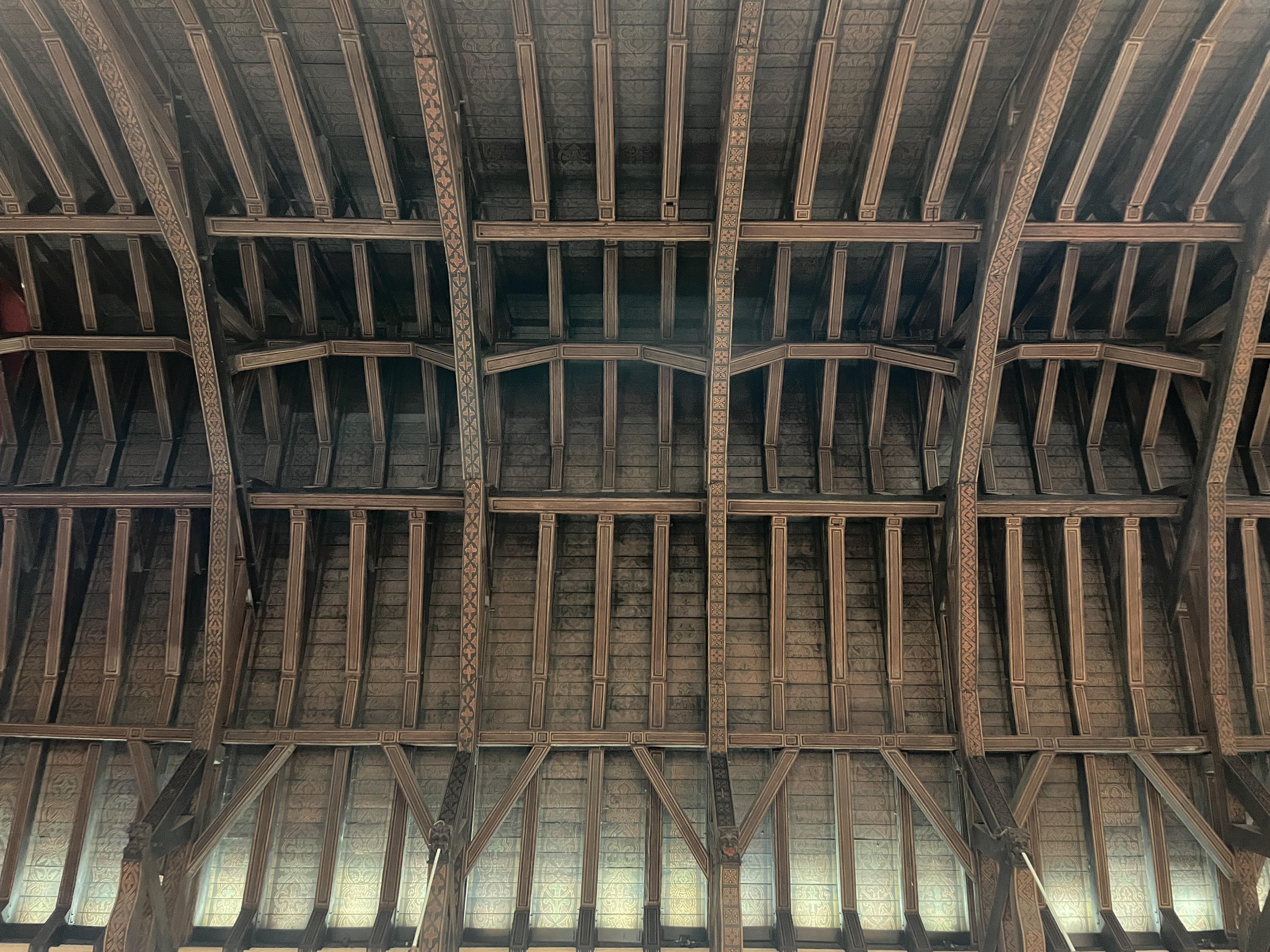 Wooden arched beam roof structure