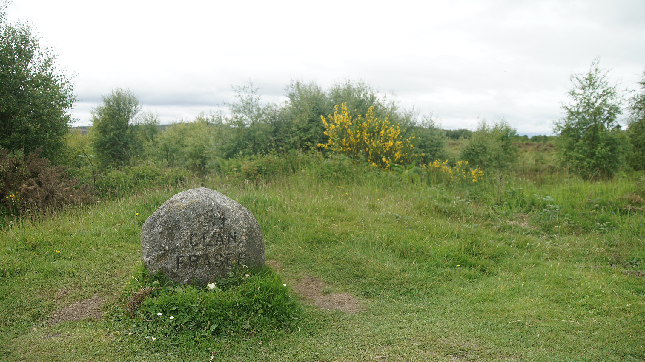Small stone marker with Clan Fraser engraved on it