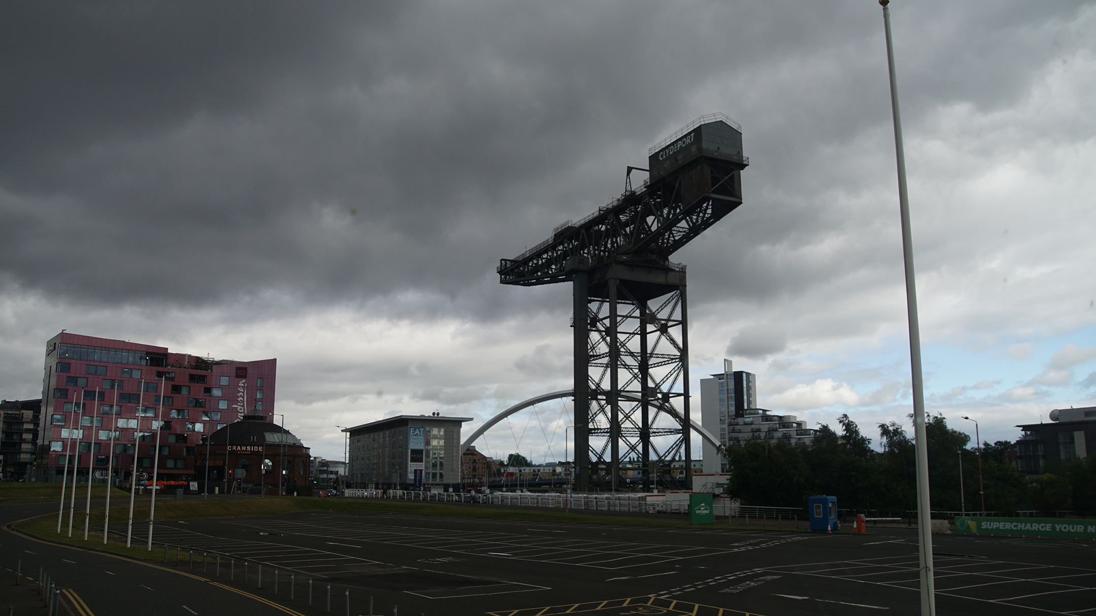 Massive steel crane structure near a river