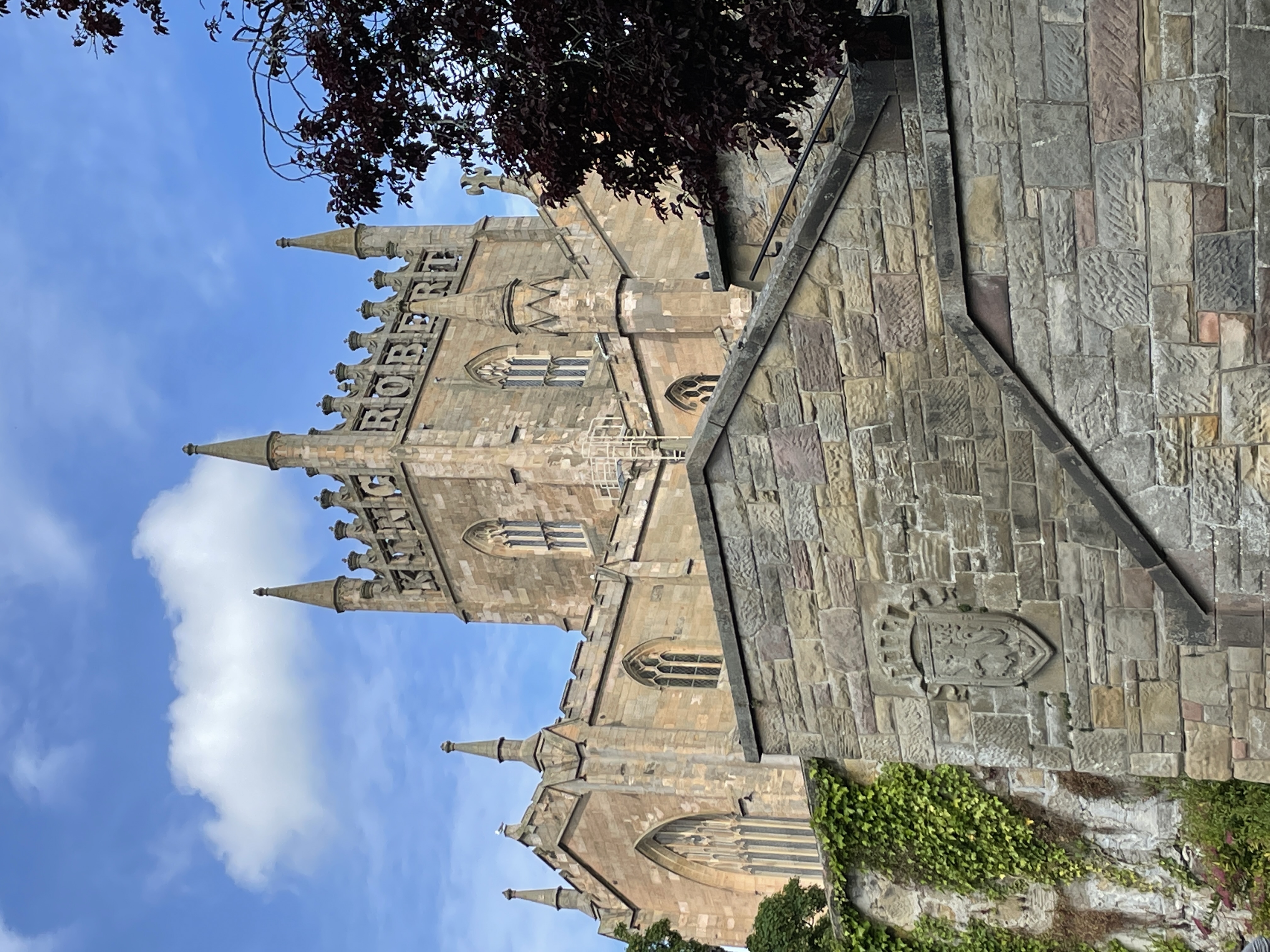 A stone tower with the words 'King' and 'Robert' worked into the stonework