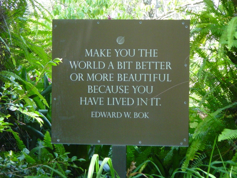 A sign shares a quote from Edward Bok reading Make you the world a bit better or more beautiful because you have lived in it